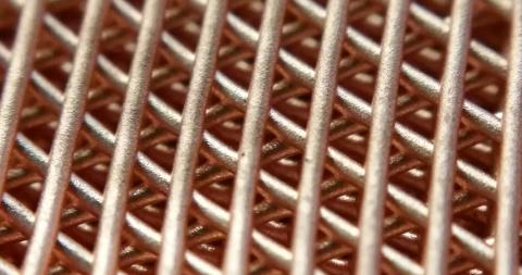 A copper lattice structure created with Northwestern Engineering's new 3-D printing process.